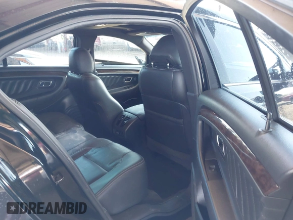 2015 Ford Taurus Limited with VIN 1FAHP2F8XFG135452, listed as a IAAI auction lot 42003510 with 71,476 mi miles. Bid and sale history available at carsss.com. Image 8.
