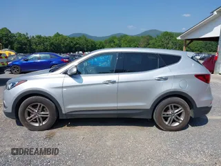 2018 Hyundai Santa Fe 2.4L z VIN 5XYZTDLB1JG546708, wystawiony jako IAAI lot #42399917 z przebiegiem 131 932 mil mil oraz . Historia ofert i sprzedaży dostępna na DreamBid. Obrazek 14.