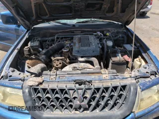 2001 Mitsubishi Montero ES z VIN JA4MT21H81P001568, wystawiony jako Copart lot #57666105 z przebiegiem 203 228 mil mil oraz Szkoda całkowita • Salvage title. Historia ofert i sprzedaży dostępna na DreamBid. Obrazek 11.