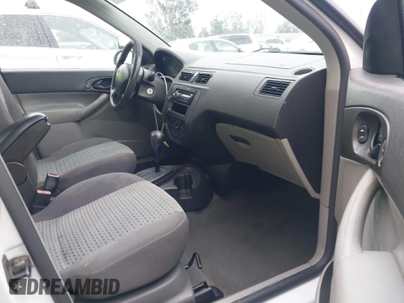 2007 Ford Focus S z VIN 1FAHP34N47W204433, wystawiony jako IAAI lot #41808035 z przebiegiem 168 756 mil mil oraz . Historia ofert i sprzedaży dostępna na DreamBid. Obrazek 5.