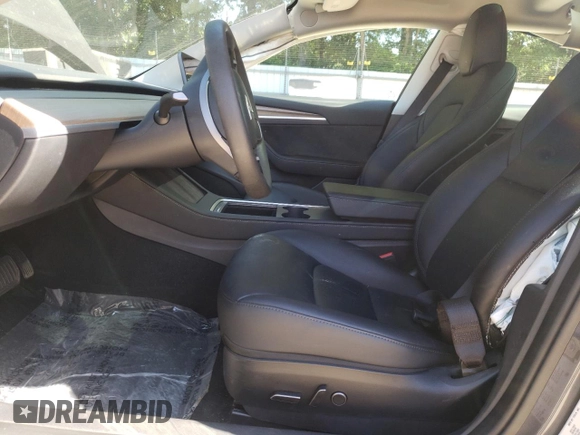 2023 Tesla Model 3 with VIN 5YJ3E1EA1PF664941, listed as a Copart auction lot 58097005 with 39,391 mi miles and Salvage title. Bid and sale history available at DreamBid. Image 7.