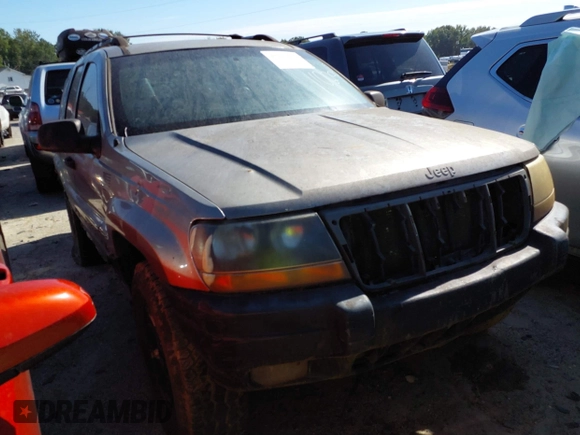 1999 Jeep Grand Cherokee Laredo with VIN 1J4GW58S0XC678864, listed as a IAAI auction lot 37593033 with Not provided miles and . Bid and sale history available at DreamBid. Image 1.