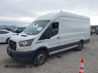 2020 Ford Transit Cargo with VIN 1FTBR3X81LKB42992, listed as a IAAI auction lot 41363461 with 206,522 mi miles and . Bid and sale history available at carsss.com. Image 17.