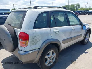 2003 Toyota RAV4 z VIN JTEGH20V230110742, wystawiony jako IAAI lot #42361323 z przebiegiem 105 474 mil mil oraz . Historia ofert i sprzedaży dostępna na DreamBid. Obrazek 4.