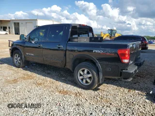 2012 Nissan Titan SV with VIN 1N6BA0EC6CN312465, listed as a Copart auction lot 58722815 with 186,207 mi miles and Salvage title. Bid and sale history available at DreamBid. Image 2.
