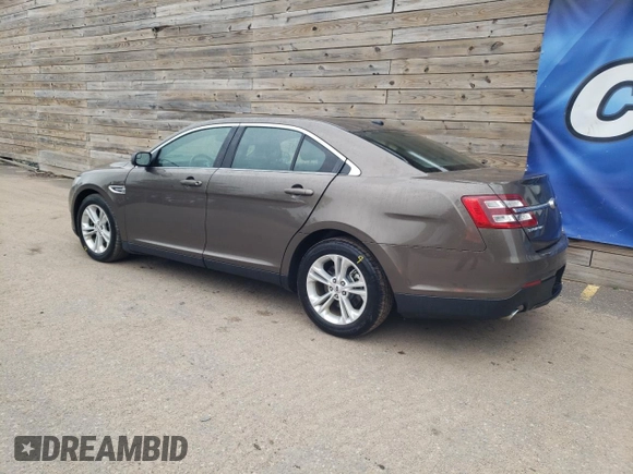 2016 Ford Taurus SEL with VIN 1FAHP2H86GG132160, listed as a Copart auction lot 61489735 with 135,437 mi miles and Clean title. Bid and sale history available at DreamBid. Image 2.