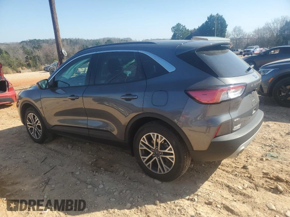 2021 Ford Escape SEL with VIN 1FMCU9H94MUB29569, listed as a Copart auction lot 48378495 with 27,702 mi miles and Salvage Title. Bid and sale history available at DreamBid. Image 2.