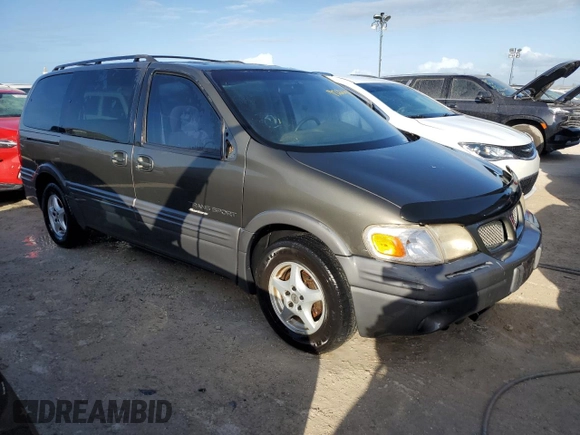 1998 Pontiac Montana z VIN 1GMDX03EXWD344453, wystawiony jako Copart lot #77226424 z przebiegiem Nie podano mil oraz Szkoda całkowita • Salvage title. Historia ofert i sprzedaży dostępna na DreamBid. Obrazek 4.