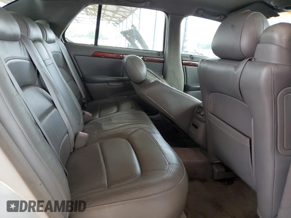 2004 Cadillac DeVille DTS z VIN 1G6KF57924U185324, wystawiony jako Copart lot #58222205 z przebiegiem 182 640 mil mil oraz Szkoda całkowita • Salvage title. Historia ofert i sprzedaży dostępna na DreamBid. Obrazek 10.