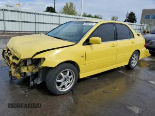 2002 Mitsubishi Lancer OZ-Rally z VIN JA3AJ86E62U024705, wystawiony jako Copart lot #55250105 z przebiegiem 217 568 mil mil oraz Szkoda całkowita • Salvage title. Historia ofert i sprzedaży dostępna na DreamBid. Obrazek 1.