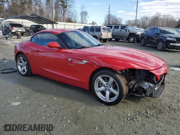 2014 BMW Z4 sDrive28i with VIN WBALL5C57EP556519, listed as a Copart auction lot 88090055 with 124,767 mi miles and Salvage Title. Bid and sale history available at carsss.com. Image 4.