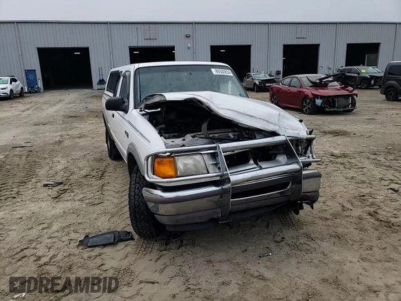 1996 Ford Ranger XLT with VIN 1FTCR15X7TPA63056, listed as a Copart auction lot 86500854 with 239,185 mi miles and Salvage Title. Bid and sale history available at DreamBid. Image 10.