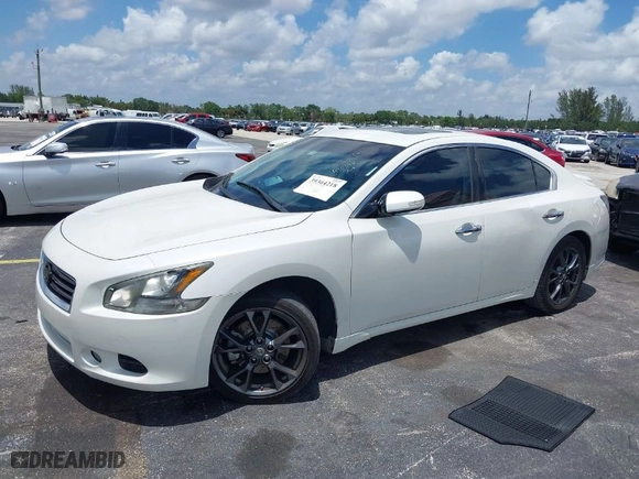 2014 Nissan Maxima 3.5 S with VIN 1N4AA5AP5EC490392, listed as a IAAI auction lot 39364218 with 104,432 mi miles. Bid and sale history available at carsss.com. Image 2.