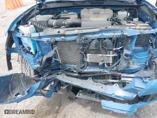 2019 Toyota Tacoma 4WD SR with VIN 3TMCZ5AN0KM260201, listed as a IAAI auction lot 42017048 with 49,216 mi miles. Bid and sale history available at carsss.com. Image 6.