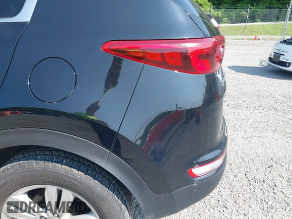 2017 Kia Sportage LX z VIN KNDPMCAC1H7285906, wystawiony jako IAAI lot #42399031 z przebiegiem 142 909 mil mil oraz . Historia ofert i sprzedaży dostępna na DreamBid. Obrazek 6.