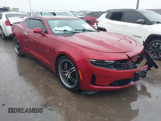 2020 Chevrolet Camaro 1LT with VIN 1G1FB1RX3L0104182, listed as a IAAI auction lot 41356747 with 71,130 mi miles and . Bid and sale history available at DreamBid. Image 1.