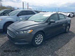 2016 Ford Fusion S z VIN 3FA6P0G79GR152156, wystawiony jako IAAI lot #41958709 z przebiegiem 204 668 mil mil oraz . Historia ofert i sprzedaży dostępna na DreamBid. Obrazek 2.