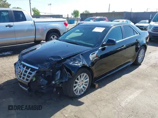 2013 Cadillac CTS Luxury with VIN 1G6DE5E51D0165634, listed as a IAAI auction lot 42208023 with 92,827 mi miles and . Bid and sale history available at DreamBid. Image 2.