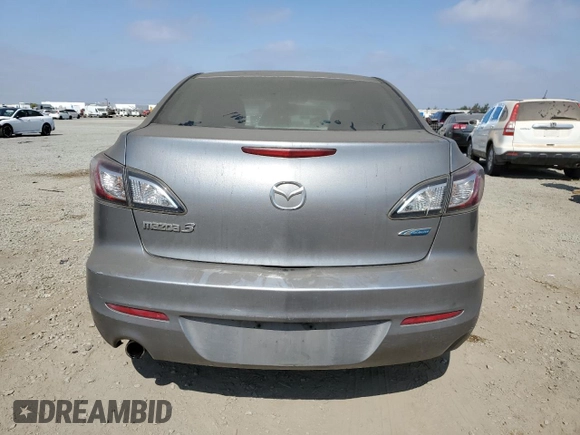 2012 Mazda 3 i Touring with VIN JM1BL1V86C1557191, listed as a Copart auction lot 63002985 with 218,863 mi miles and Clean title. Bid and sale history available at DreamBid. Image 6.