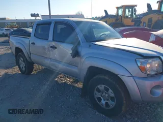 2008 Toyota Tacoma PreRunner with VIN 3TMJU62N38M062716, listed as a IAAI auction lot 41275247 with 234,768 mi miles. Bid and sale history available at carsss.com. Image 1.