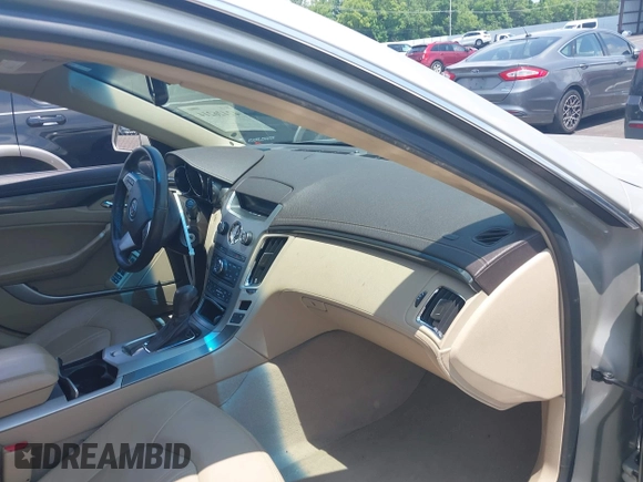 2013 Cadillac CTS Performance with VIN 1G6DK5E31D0146699, listed as a IAAI auction lot 42426214 with 96,520 mi miles and . Bid and sale history available at DreamBid. Image 5.