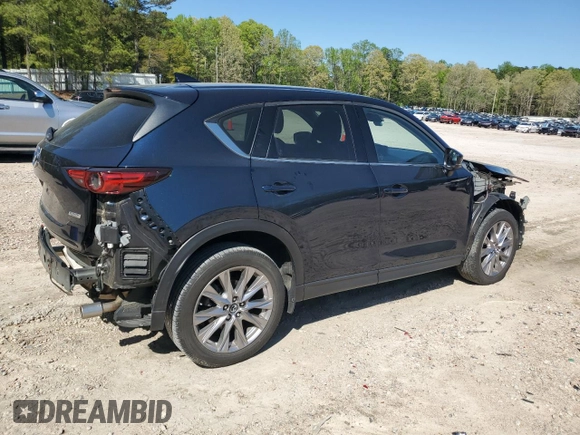 2019 Mazda CX-5 Grand Touring with VIN JM3KFBDMXK0540725, listed as a Copart auction lot 52395185 with 33,838 mi miles and Salvage Title. Bid and sale history available at carsss.com. Image 3.