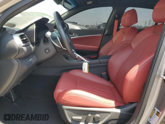 2024 Genesis G70 2.5T with VIN KMTG34SC7RU139599, listed as a Copart auction lot 62535435 with 9,416 mi miles and Salvage title. Bid and sale history available at DreamBid. Image 7.