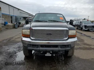 2000 Ford F-250 XL with VIN 1FTNX21L5YEC66604, listed as a Copart auction lot 51754055 with 167,798 mi miles and Salvage title. Bid and sale history available at DreamBid. Image 5.