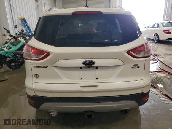 2016 Ford Escape SE with VIN 1FMCU9G98GUA57054, listed as a Copart auction lot 45194475 with 143,864 mi miles and Clean Title. Bid and sale history available at DreamBid. Image 6.
