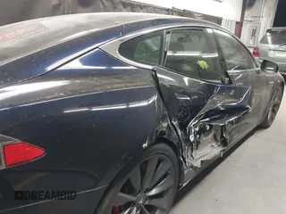 2014 Tesla Model S 60 with VIN 5YJSA1H11EFP56406, listed as a IAAI auction lot 42065157 with Not Provided miles and . Bid and sale history available at DreamBid. Image 6.