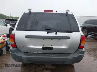 2004 Jeep Grand Cherokee Laredo z VIN 1J4GW48S64C132172, wystawiony jako IAAI lot #42163524 z przebiegiem 170 952 mil mil oraz . Historia ofert i sprzedaży dostępna na DreamBid. Obrazek 16.