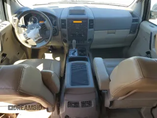 2012 Nissan Titan SV with VIN 1N6BA0ED9CN302103, listed as a Copart auction lot 52678495 with 214,564 mi miles and Salvage title. Bid and sale history available at DreamBid. Image 8.