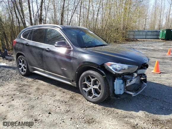 2018 BMW X1 xDrive28i with VIN WBXHT3C3XJ5K27379, listed as a Copart auction lot 52136315 with 79,428 mi miles and Clean Title. Bid and sale history available at carsss.com. Image 4.