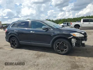 2012 Mazda CX-9 Grand Touring z VIN JM3TB2DAXC0358272, wystawiony jako Copart lot #60703665 z przebiegiem 278 558 mil mil oraz Szkoda całkowita • Salvage title. Historia ofert i sprzedaży dostępna na DreamBid. Obrazek 4.