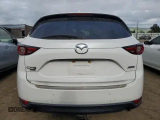 2019 Mazda CX-5 Signature with VIN JM3KFBEYXK0537826, listed as a Copart auction lot 50063015 with 76,448 mi miles and Salvage Title. Bid and sale history available at carsss.com. Image 6.