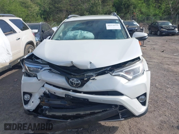 2017 Toyota RAV4 Limited with VIN 2T3YFREV8HW322208, listed as a IAAI auction lot 41974231 with 74,027 mi miles. Bid and sale history available at carsss.com. Image 6.