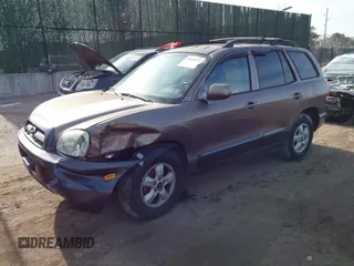 2005 Hyundai Santa Fe GLS z VIN KM8SC13D45U929446, wystawiony jako IAAI lot #41200311 z przebiegiem 157 669 mil mil oraz . Historia ofert i sprzedaży dostępna na DreamBid. Obrazek 2.