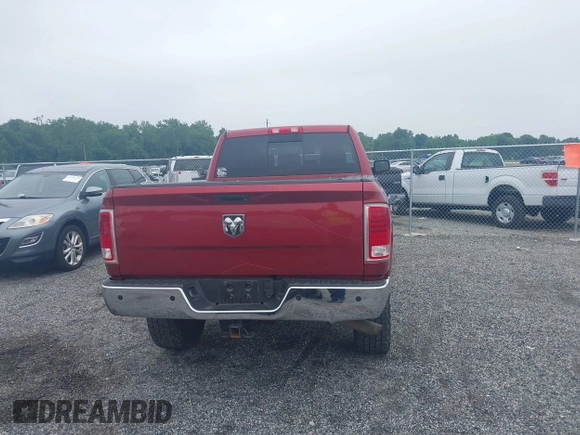 2014 Ram 2500 Laramie with VIN 3C6UR5NJ1EG276591, listed as a IAAI auction lot 42517879 with 145,466 mi miles and . Bid and sale history available at DreamBid. Image 16.