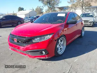 2019 Honda Civic Sport with VIN 2HGFC2F81KH538037, listed as a IAAI auction lot 41377964 with 72,560 mi miles and . Bid and sale history available at DreamBid. Image 2.