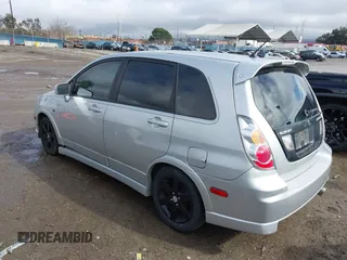 2005 Suzuki Aerio SX z VIN JS2RC61H255300970, wystawiony jako IAAI lot #41536603 z przebiegiem Nie podano mil oraz . Historia ofert i sprzedaży dostępna na DreamBid. Obrazek 3.