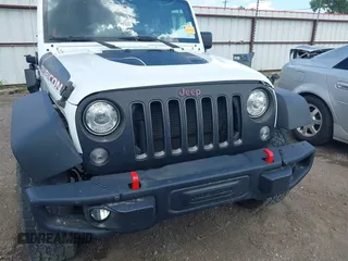 2017 Jeep Wrangler Unlimited Rubicon Recon with VIN 1C4BJWFG1HL693572, listed as a IAAI auction lot 42601855 with 64,342 mi miles and . Bid and sale history available at DreamBid. Image 12.
