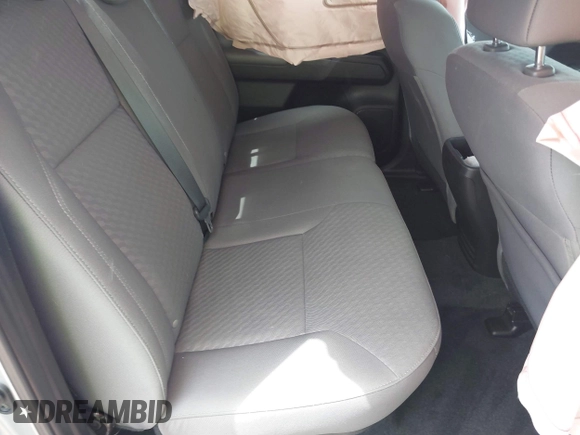 2023 Toyota Tacoma SR with VIN 3TYCZ5AN4PT149730, listed as a IAAI auction lot 42083146 with 31,731 mi miles and . Bid and sale history available at DreamBid. Image 8.
