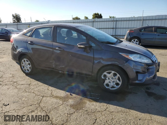 2013 Ford Fiesta SE z VIN 3FADP4BJ9DM186382, wystawiony jako Copart lot #67754934 z przebiegiem 157 495 mil mil oraz Szkoda całkowita • Salvage title. Historia ofert i sprzedaży dostępna na DreamBid. Obrazek 4.