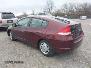 2011 Honda Insight LX z VIN JHMZE2H52BS004304, wystawiony jako IAAI lot #41827541 z przebiegiem 141 072 mil mil oraz . Historia ofert i sprzedaży dostępna na DreamBid. Obrazek 3.