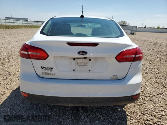 2018 Ford Focus SE with VIN 1FADP3FE0JL227146, listed as a Copart auction lot 56151985 with 124,517 mi miles and Salvage title. Bid and sale history available at DreamBid. Image 6.
