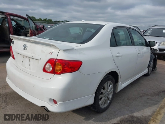 2010 Toyota Corolla with VIN 2T1BU4EEXAC521114, listed as a IAAI auction lot 42066903 with 208,509 mi miles. Bid and sale history available at carsss.com. Image 4.