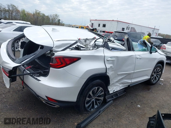 2021 Lexus RX with VIN 2T2HZMDA3MC282824, listed as a IAAI auction lot 42019255 with 1 mi miles. Bid and sale history available at carsss.com. Image 6.