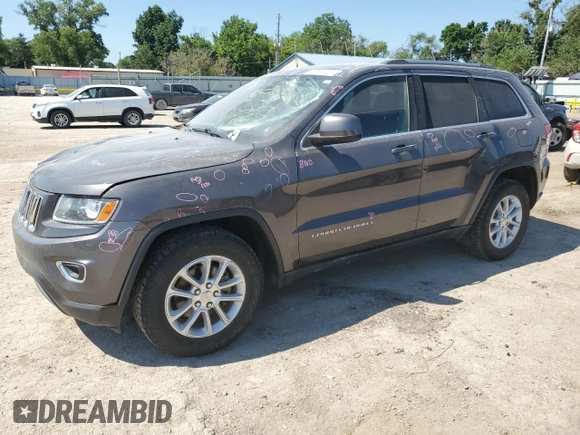 2016 Jeep Grand Cherokee Laredo with VIN 1C4RJFAG2GC328841, listed as a Copart auction lot 63553435 with 100,472 mi miles and Salvage title. Bid and sale history available at DreamBid. Image 1.