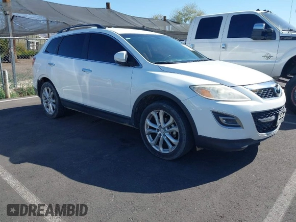 2012 Mazda CX-9 Grand Touring z VIN JM3TB3DA5C0349176, wystawiony jako IAAI lot #41960691 z przebiegiem 207 445 mil mil oraz . Historia ofert i sprzedaży dostępna na DreamBid. Obrazek 1.