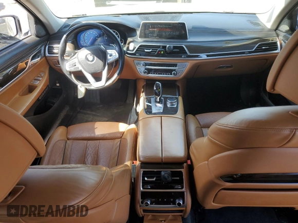 2016 BMW 7 Series 750i xDrive с VIN WBA7F2C57GG418537, выставлен на аукционе Copart как лот 48028195 с пробегом 110 714 миль миль и Списание • Salvage title. История ставок и продаж доступна на DreamBid. Изображение 8.